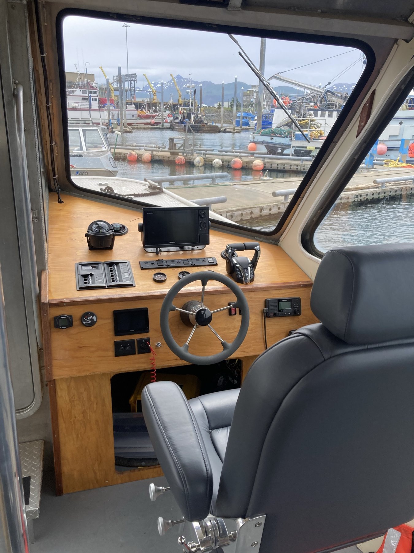 Onboard the M/V Inlet Express — the helm on our Kachemak Bay water taxi